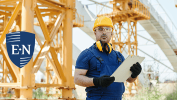 A foreman reviewing his construction safety program.