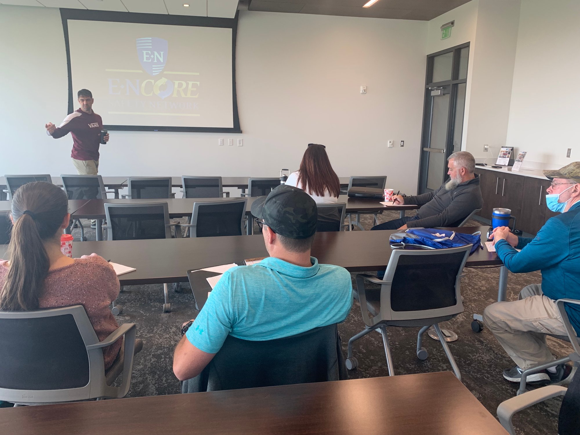 A speaker discusses creating a safe culture at ENCORE Safety Network event