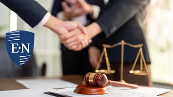 Two people shaking hands over third-party litigation funding.